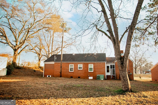 603 E Main St, Thomaston, GA 30286 - rear view of house featuring cooling unit, crawl space, brick siding, and roof with shingles