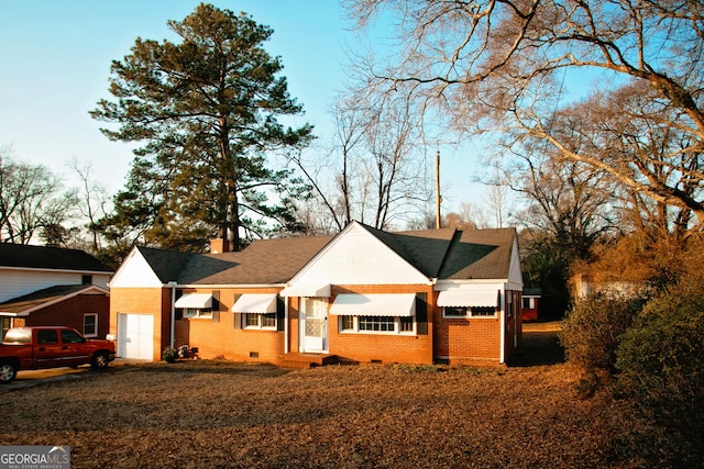 603 E Main St, Thomaston, GA 30286 - single story home with brick siding, a garage, a chimney, and crawl space