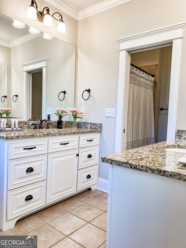 full bathroom featuring baseboards, ornamental molding, tile patterned flooring, and vanity