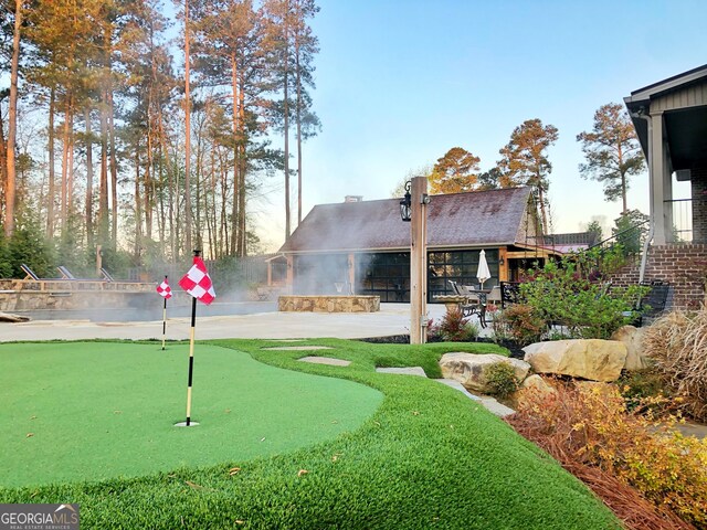 view of property's community with a patio