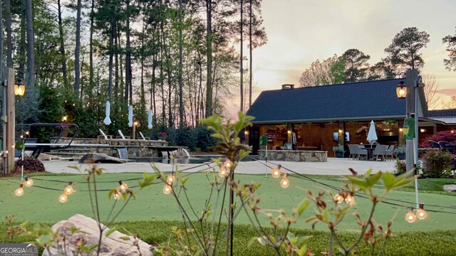 surrounding community with a patio area
