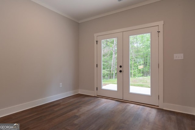 doorway with baseboards, ornamental molding, french doors, and dark wood-type flooring