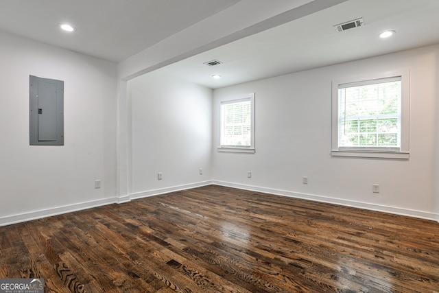 2195 Penelope St NW, Atlanta, GA 30314 - spare room with electric panel, dark wood-style flooring, and recessed lighting