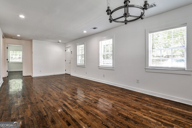 2195 Penelope St NW, Atlanta, GA 30314 - spare room featuring a chandelier, dark wood-style flooring, and recessed lighting