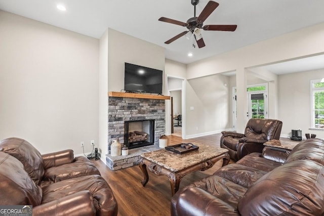 1515 Cabin Creek Trl, Griffin, GA 30223 - living area with wood finished floors, a stone fireplace, baseboards, recessed lighting, and a ceiling fan
