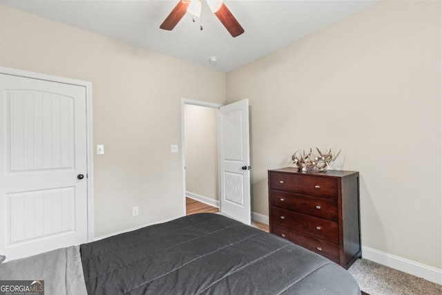 1515 Cabin Creek Trl, Griffin, GA 30223 - bedroom with baseboards, carpet, and a ceiling fan