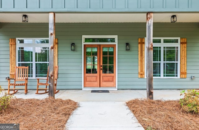 1515 Cabin Creek Trl, Griffin, GA 30223 - doorway to property featuring covered porch