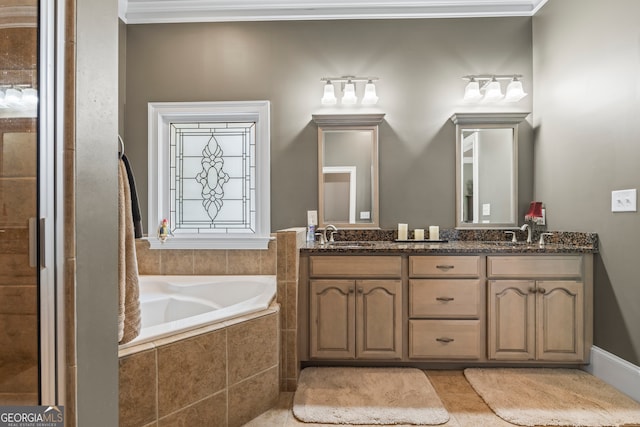 160 Evans Dr, Bogart, GA 30622 - full bath with double vanity, a garden tub, a stall shower, tile patterned floors, and ornamental molding