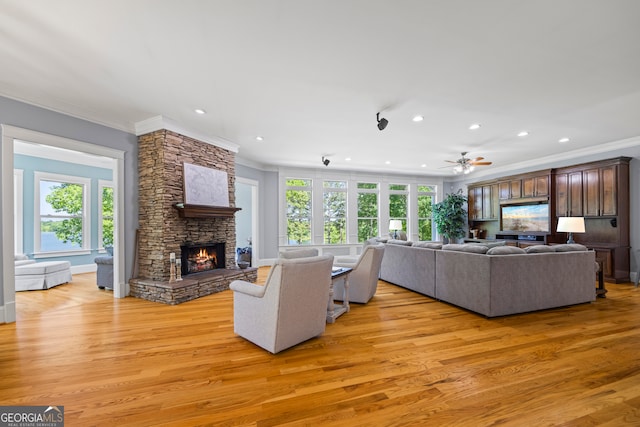 160 Evans Dr, Bogart, GA 30622 - living room with ornamental molding, light wood-style floors, a fireplace, recessed lighting, and ceiling fan