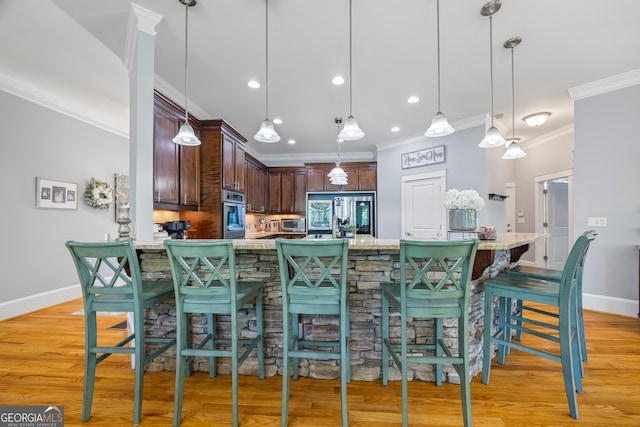 160 Evans Dr, Bogart, GA 30622 - kitchen with ornamental molding, smart refrigerator, stainless steel oven, dark brown cabinets, and baseboards