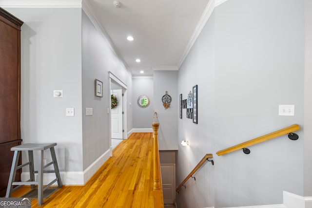 160 Evans Dr, Bogart, GA 30622 - hallway featuring ornamental molding, light wood-style flooring, an upstairs landing, recessed lighting, and baseboards