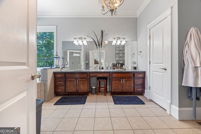 160 Evans Dr, Bogart, GA 30622 - full bath with double vanity, crown molding, a chandelier, a stall shower, and tile patterned floors