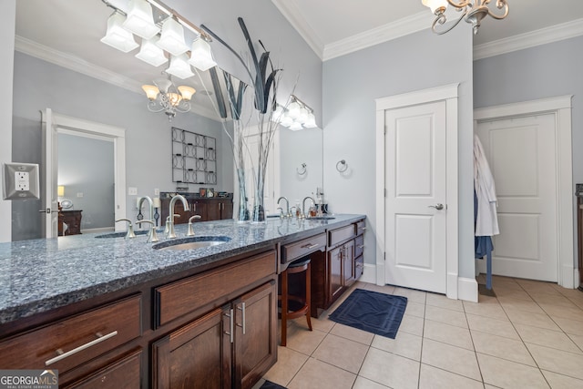 160 Evans Dr, Bogart, GA 30622 - full bath featuring a chandelier, double vanity, ornamental molding, tile patterned flooring, and baseboards