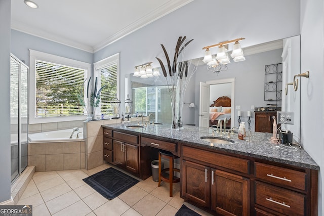 160 Evans Dr, Bogart, GA 30622 - ensuite bathroom featuring tile patterned floors, double vanity, a bath, ornamental molding, and a shower stall