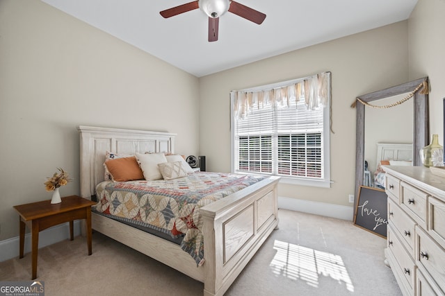 160 Evans Dr, Bogart, GA 30622 - bedroom featuring light carpet, baseboards, and a ceiling fan