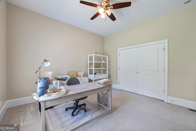 160 Evans Dr, Bogart, GA 30622 - home office with light carpet, a ceiling fan, and baseboards