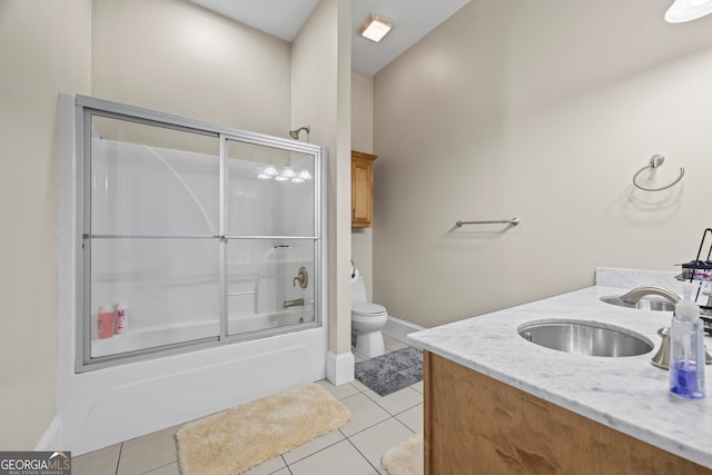 160 Evans Dr, Bogart, GA 30622 - bathroom featuring vanity, toilet, tile patterned flooring, shower / bath combination with glass door, and baseboards