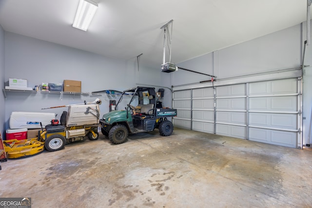 160 Evans Dr, Bogart, GA 30622 - garage featuring a garage door opener
