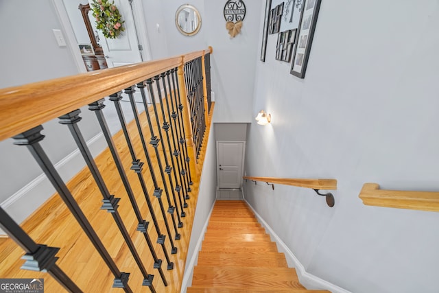 160 Evans Dr, Bogart, GA 30622 - stairway with wood finished floors and baseboards