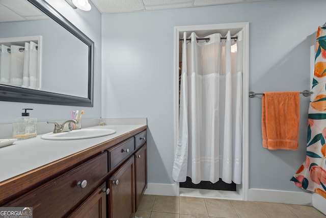 160 Evans Dr, Bogart, GA 30622 - full bath featuring tile patterned floors, vanity, baseboards, a paneled ceiling, and a shower with shower curtain
