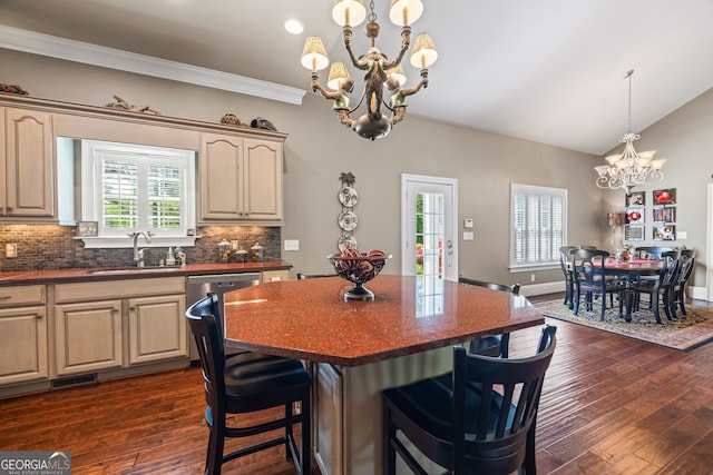 160 Evans Dr, Bogart, GA 30622 - dining space with a chandelier, dark wood finished floors, vaulted ceiling, ornamental molding, and baseboards