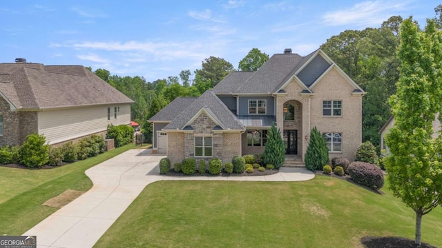 traditional-style house featuring concrete driveway, brick siding, a chimney, and a front lawn