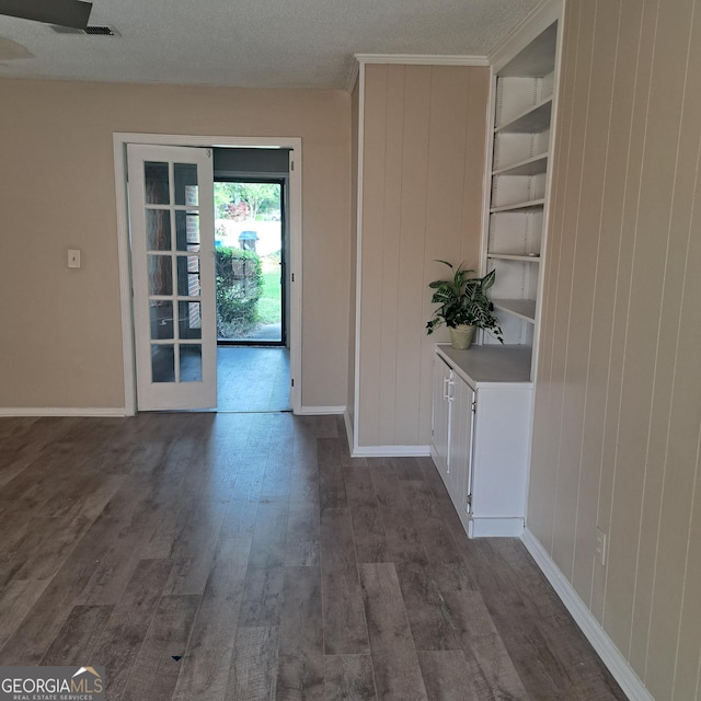 6000 Caribou Dr, Columbus, GA 31907 - doorway featuring dark wood-type flooring, baseboards, and wooden walls
