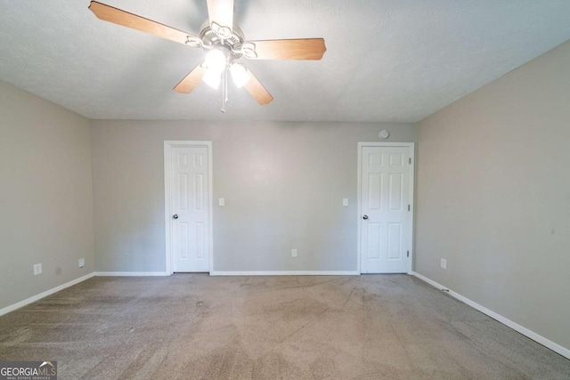 744 Brittany Ct, Stone Mountain, GA 30083 - carpeted empty room with baseboards and a ceiling fan