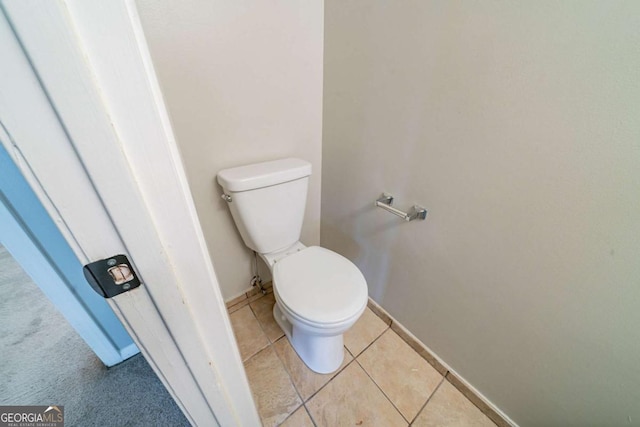 744 Brittany Ct, Stone Mountain, GA 30083 - bathroom with toilet and tile patterned floors