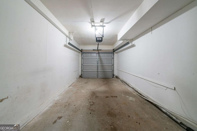 744 Brittany Ct, Stone Mountain, GA 30083 - garage featuring a garage door opener
