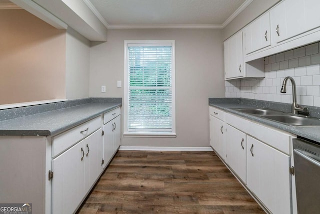 744 Brittany Ct, Stone Mountain, GA 30083 - kitchen featuring stainless steel dishwasher, dark wood-style floors, crown molding, and a sink