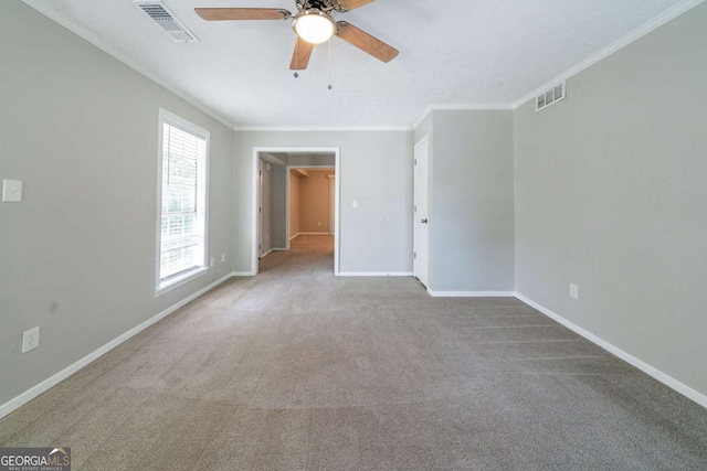 744 Brittany Ct, Stone Mountain, GA 30083 - unfurnished room with ornamental molding, carpet, baseboards, and visible vents