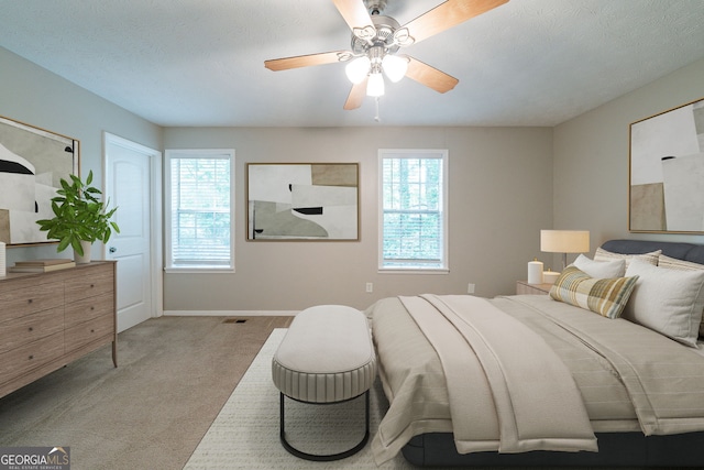 744 Brittany Ct, Stone Mountain, GA 30083 - bedroom with carpet, visible vents, baseboards, and ceiling fan