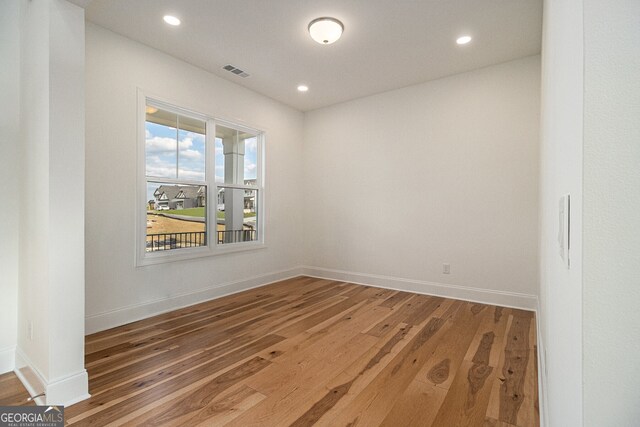 4039 Tallow Pl, Woodstock, GA 30188 - unfurnished room featuring recessed lighting, baseboards, visible vents, and hardwood / wood-style flooring