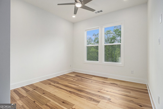 4039 Tallow Pl, Woodstock, GA 30188 - unfurnished room with a ceiling fan, light wood-style floors, and recessed lighting