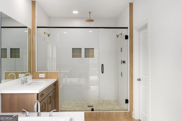 4039 Tallow Pl, Woodstock, GA 30188 - bathroom featuring vanity, a stall shower, and recessed lighting