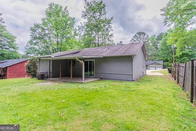 332 Cheryl Ct, Jonesboro, GA 30238 - back of property featuring a patio and central AC
