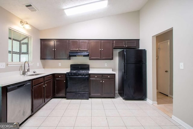 332 Cheryl Ct, Jonesboro, GA 30238 - kitchen featuring black appliances, under cabinet range hood, lofted ceiling, a sink, and light countertops