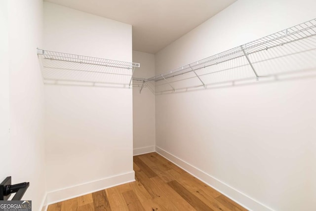 5734 Nix Bridge Rd, Gainesville, GA 30506 - spacious closet featuring light wood-style floors