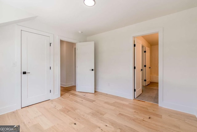 5734 Nix Bridge Rd, Gainesville, GA 30506 - unfurnished bedroom with light wood-type flooring