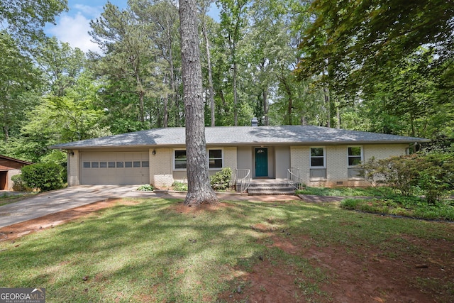 4420 Lake Breeze Dr, Stone Mountain, GA 30083 - ranch-style house with brick siding, an attached garage, a front yard, and concrete driveway