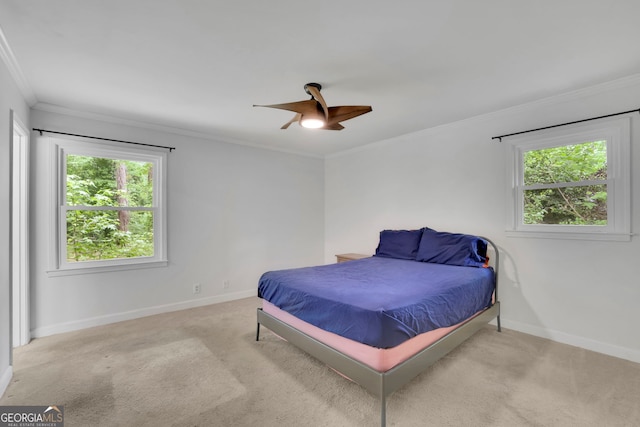 4420 Lake Breeze Dr, Stone Mountain, GA 30083 - carpeted bedroom featuring crown molding, baseboards, and multiple windows