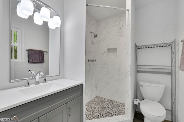 4420 Lake Breeze Dr, Stone Mountain, GA 30083 - bathroom featuring vanity, a stall shower, and toilet