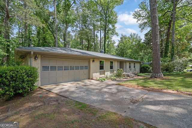 4420 Lake Breeze Dr, Stone Mountain, GA 30083 - single story home with brick siding, driveway, and a garage