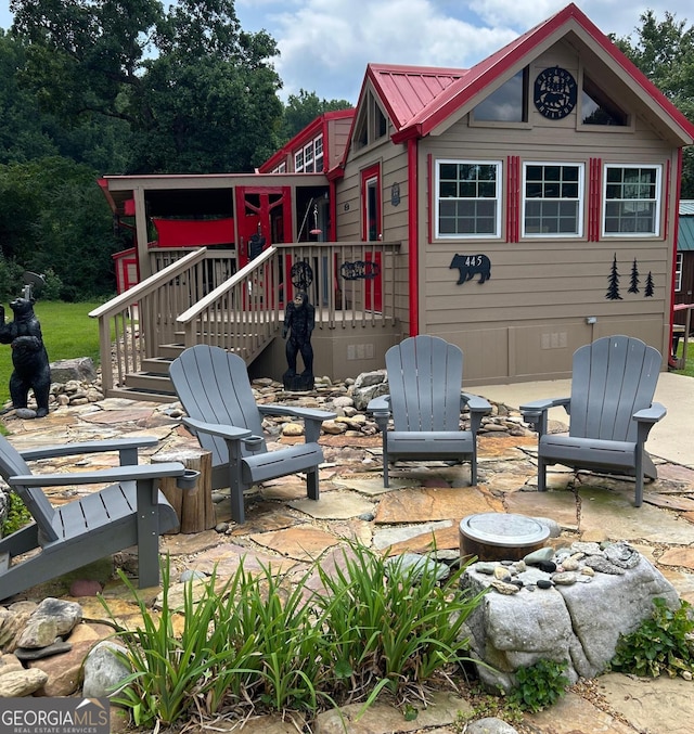 view of patio featuring stairway