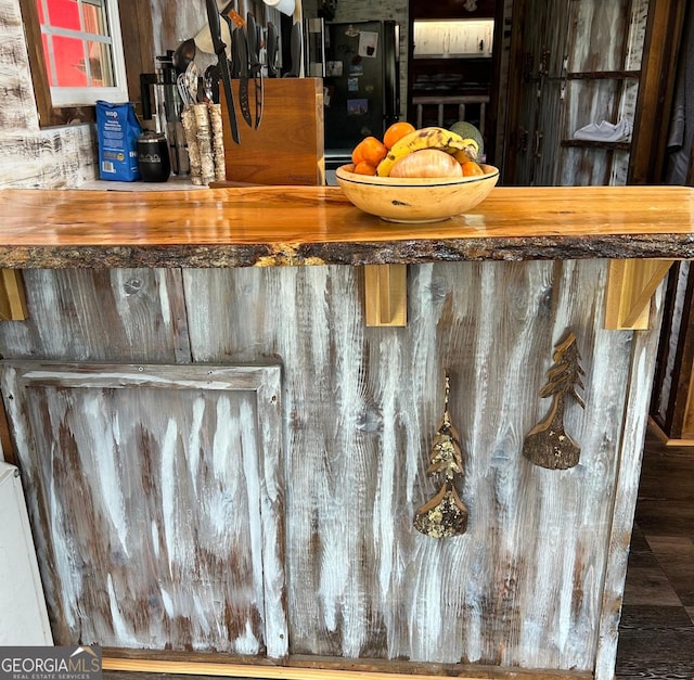 details featuring freestanding refrigerator