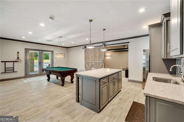 2935 Manorview Ln, Milton, GA 30004 - playroom with crown molding, a sink, baseboards, and pool table