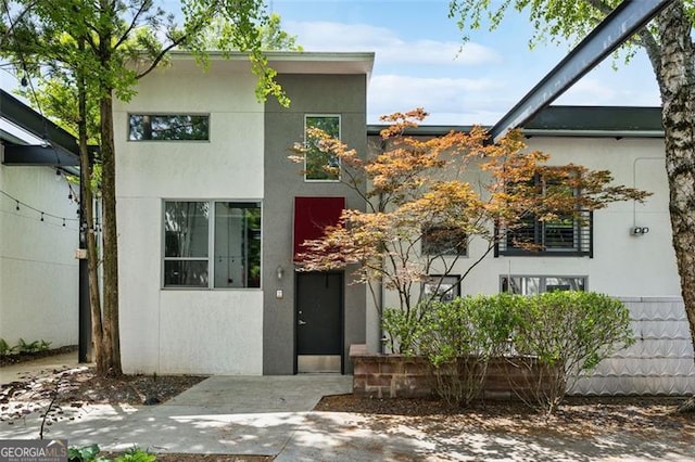 195 Arizona Ave Unit 104, Atlanta, GA 30307 - contemporary home featuring stucco siding