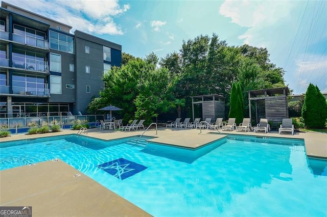 195 Arizona Ave Unit 104, Atlanta, GA 30307 - pool with a patio area and fence
