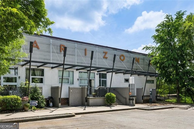 195 Arizona Ave Unit 104, Atlanta, GA 30307 - rear view of house with stucco siding
